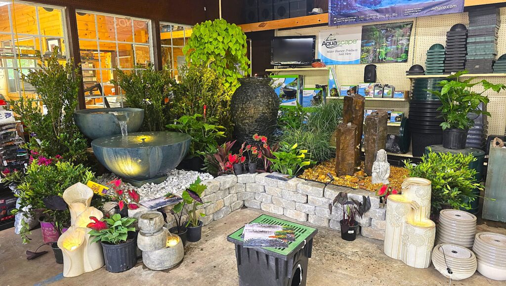 Water feature and fountainscape display with landscape plants at Woody's Nursery in Duluth, GA